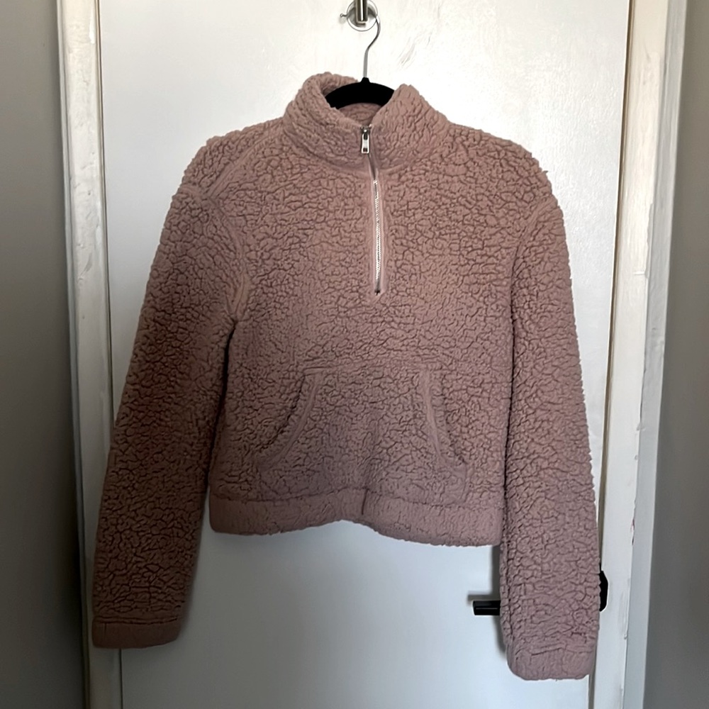 pink garage sweater